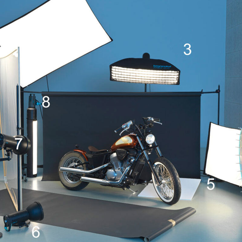 In this How-To you will learn how to shoot a complete motorbike with no less than 8 light shapers &amp; lamps. - Dragon Image